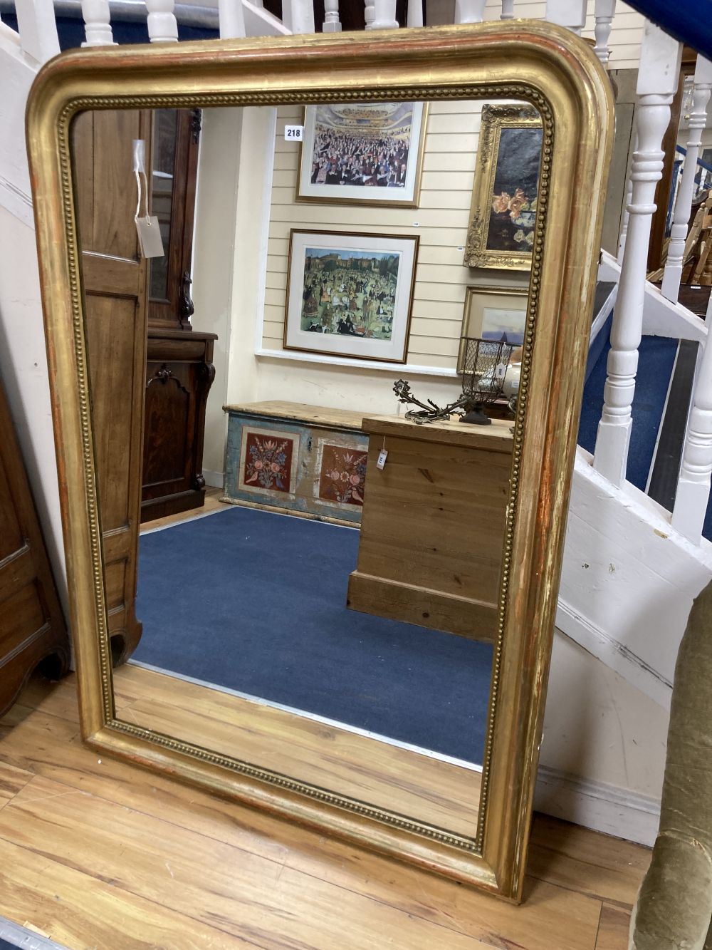 A Victorian giltwood and gesso overmantel mirror, width 104cm height 148cm